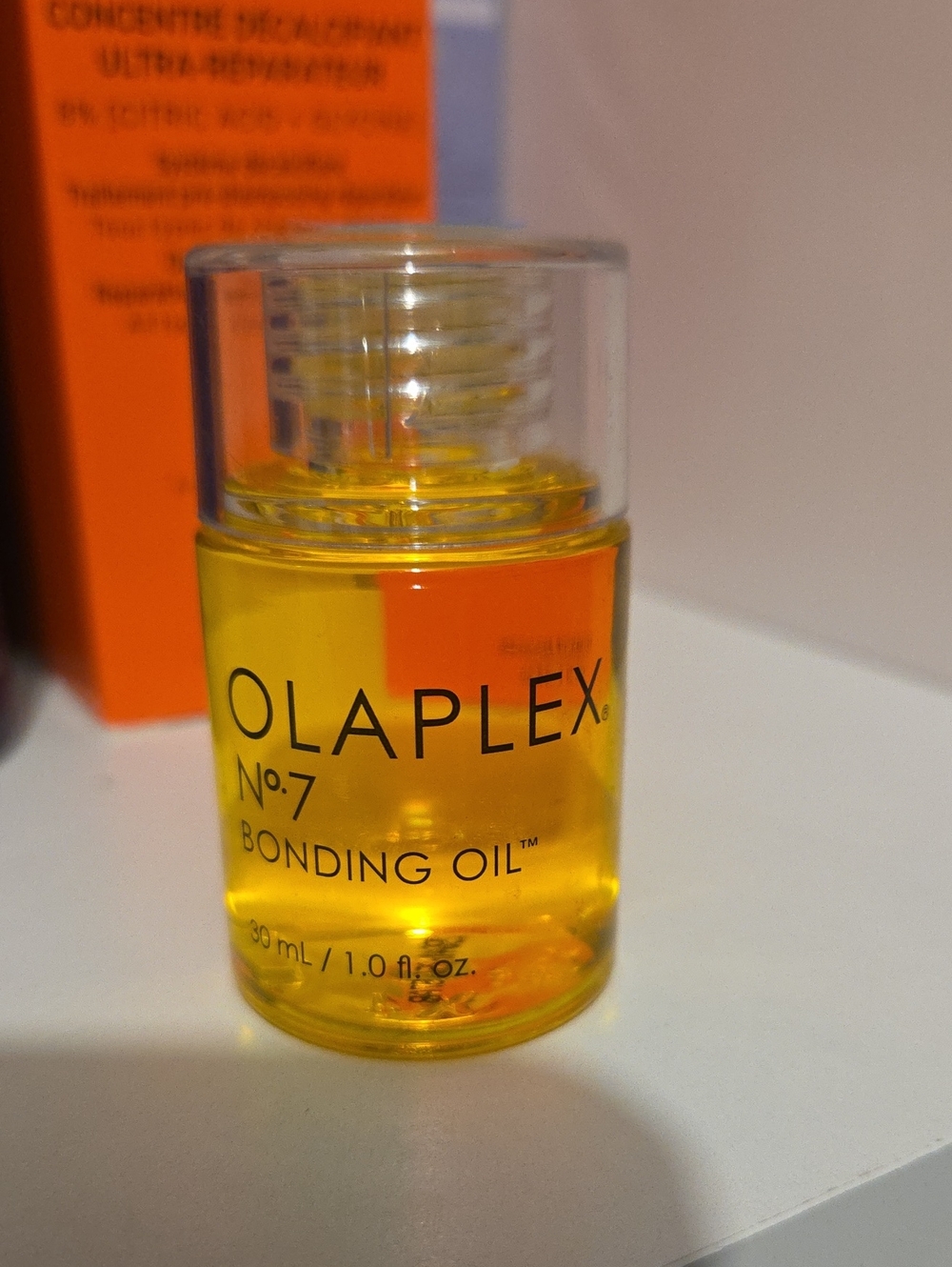 OLAPLEX No.7 Bonding Oil - Yellow and Clear Bottle